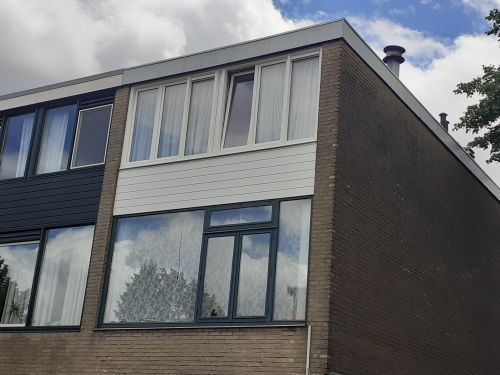 Renovatie 55 woningen Ommoord geluidsisolatie.